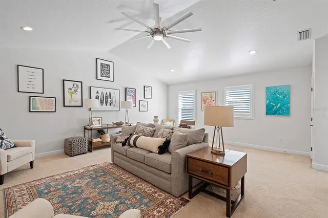 a view of a lake with sitting area