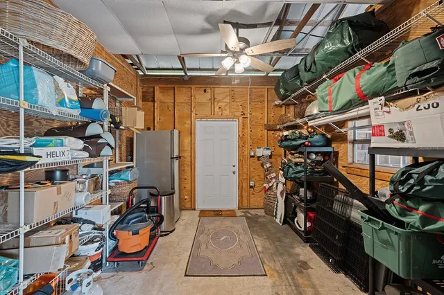 a view of a park with large trees