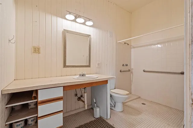 a front view of a house with yard porch and green space