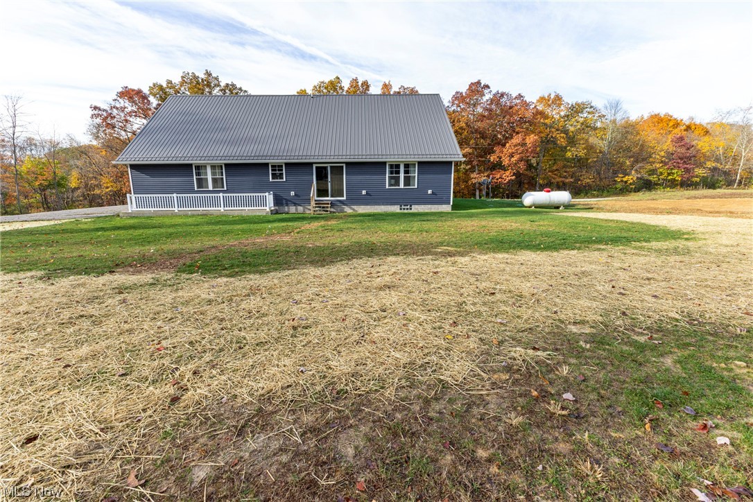 45588 County Road Cadiz, OH 43907 - Photo 29 of 35 View of rear of the home with access to walk out basement.