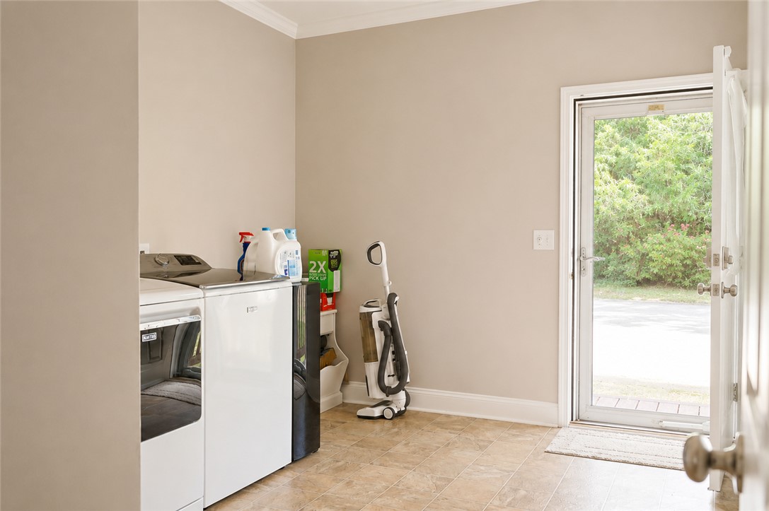 190 Fred Bradford Road Iva, SC 29655 - Photo 25 of 32 Functional laundry room offering practical utility and convenient outdoor access.