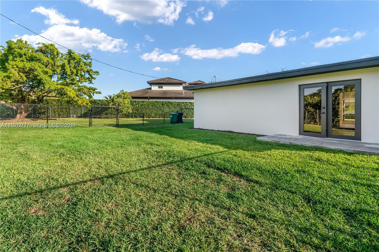 8421 Southwest 27th Terrace Miami, FL 33155 - Photo 11 of 22 a view of a backyard with a garden