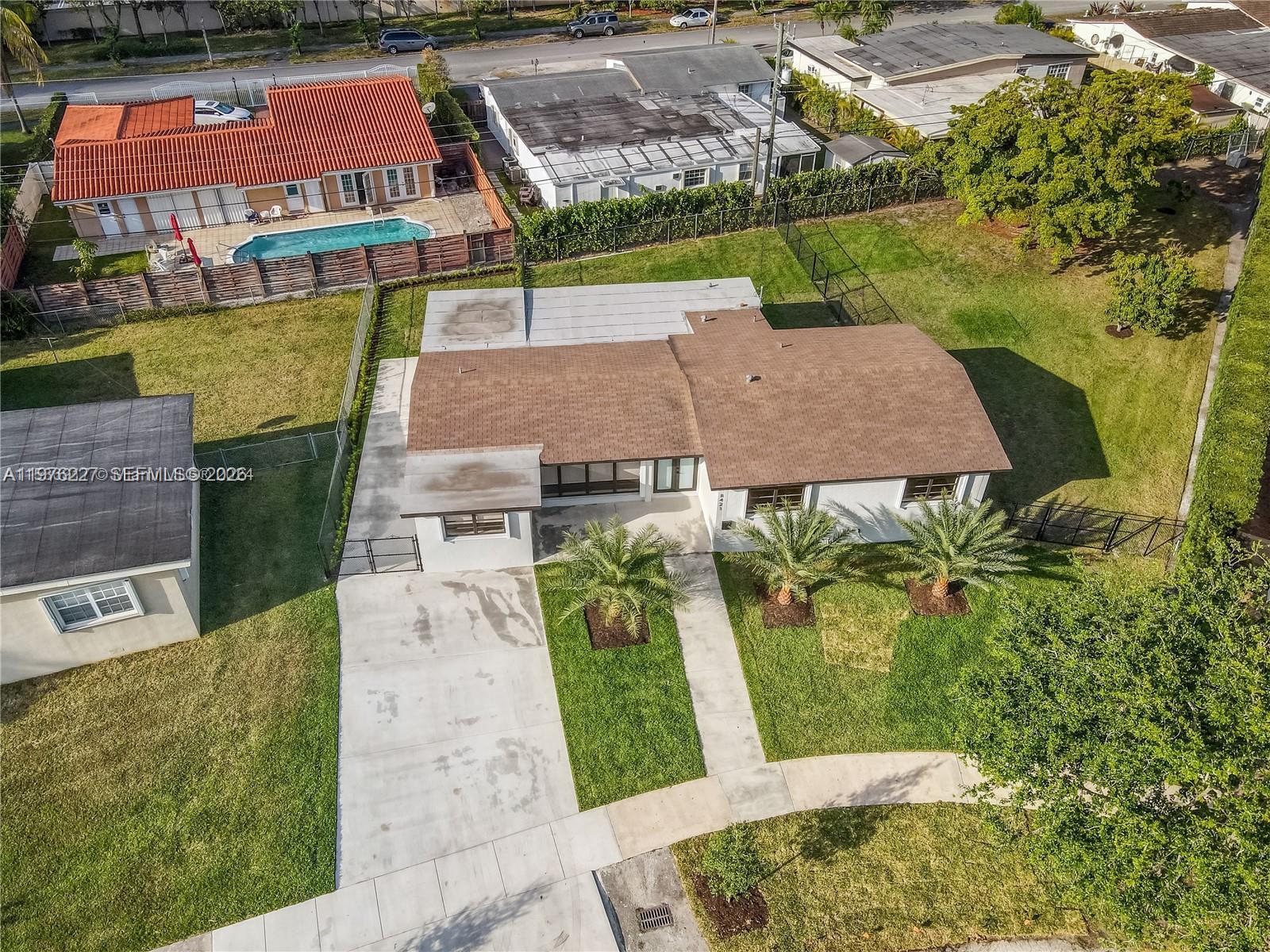 8421 Southwest 27th Terrace Miami, FL 33155 - Photo 12 of 22 an aerial view of a house with garden space and street view