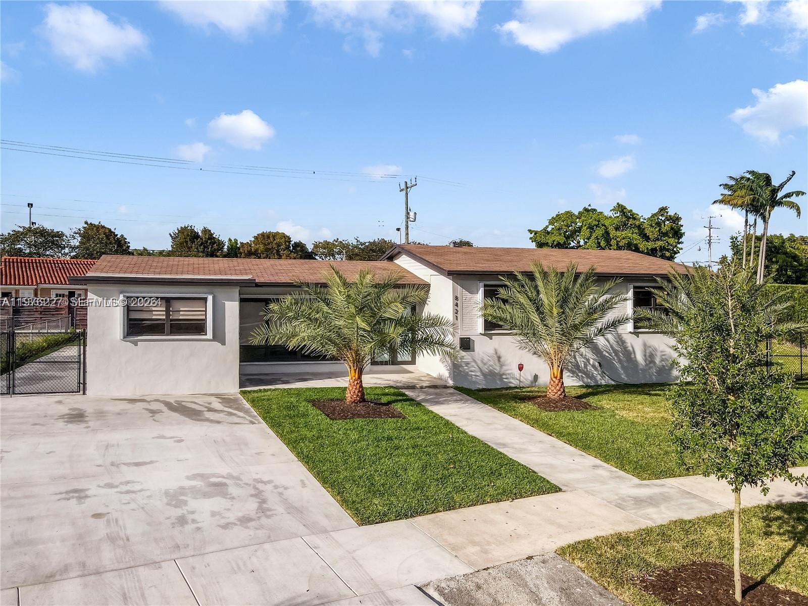 8421 Southwest 27th Terrace Miami, FL 33155 - Photo 13 of 22 a view of a house with a yard