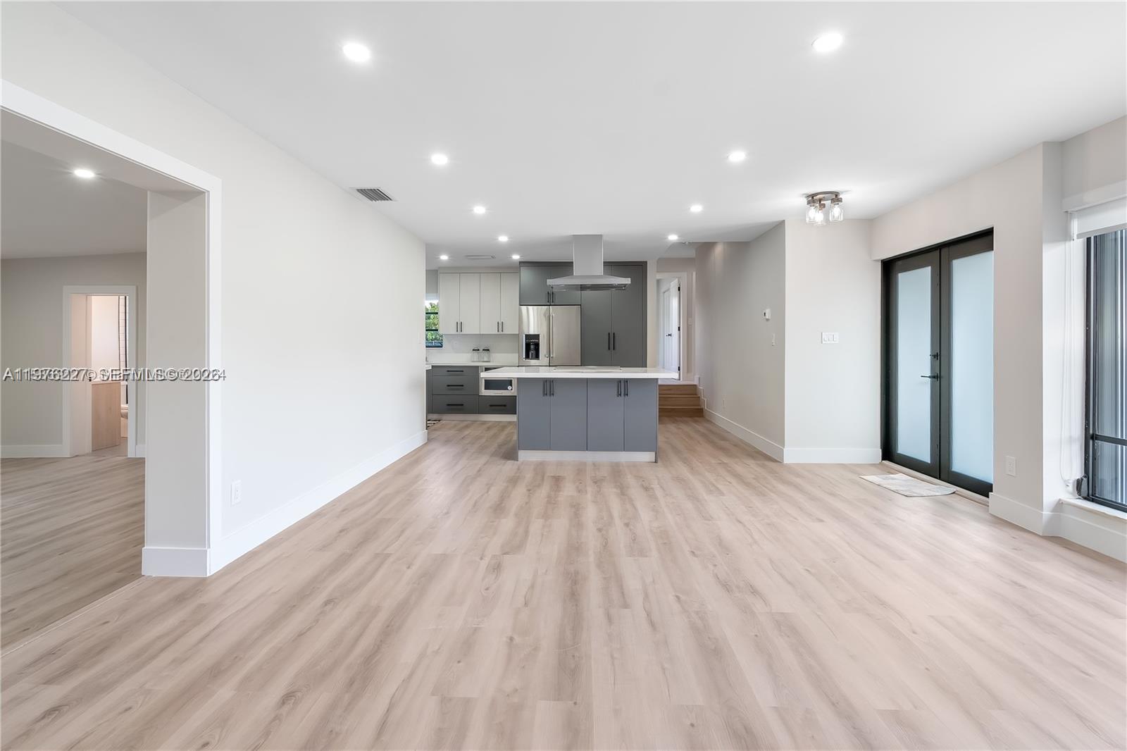 8421 Southwest 27th Terrace Miami, FL 33155 - Photo 15 of 22 a view of kitchen with wooden floor