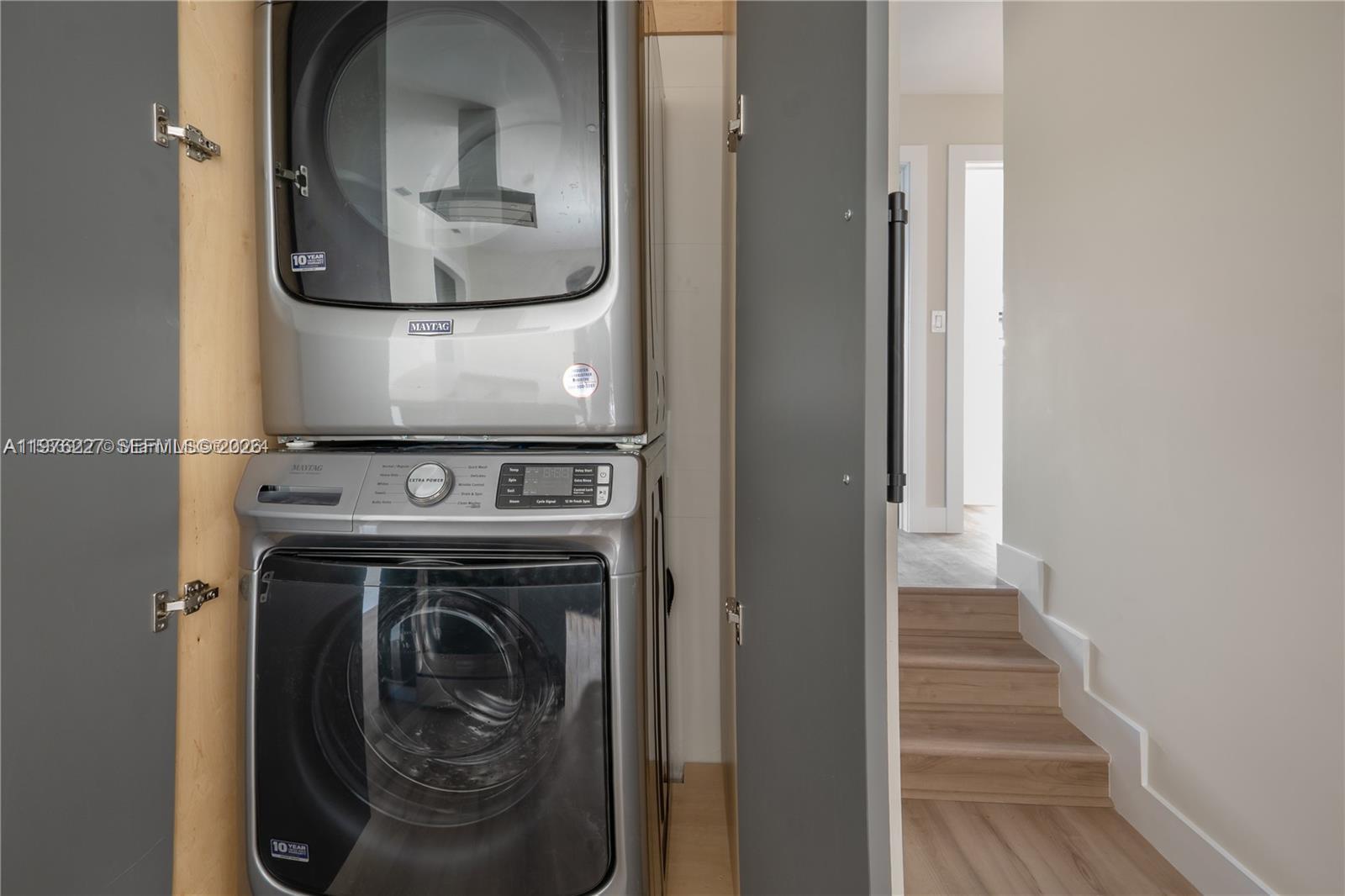 8421 Southwest 27th Terrace Miami, FL 33155 - Photo 9 of 22 a view of washer and dryer in a utility room