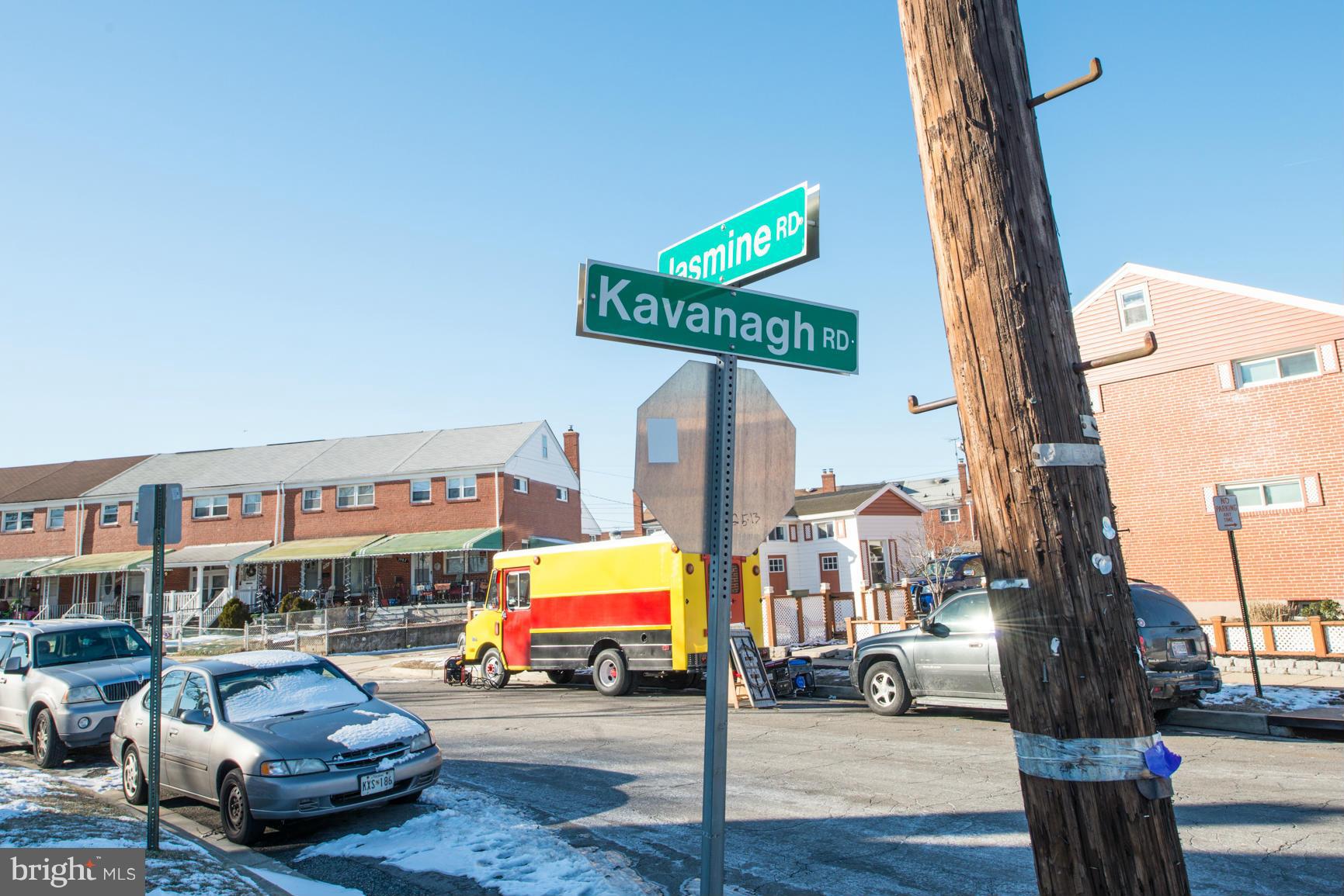 8331 Kavanagh Road Baltimore, MD 21222 - Photo 27 of 28 a city street with cars parked in front of it