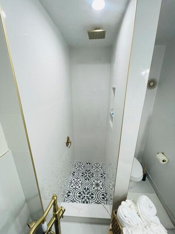 5537 Southwest 6th Street Margate, FL 33068 - Photo 23 of 40 a bathroom with a sink and toilet