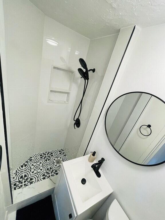5537 Southwest 6th Street Margate, FL 33068 - Photo 34 of 40 a bathroom with a sink and a mirror