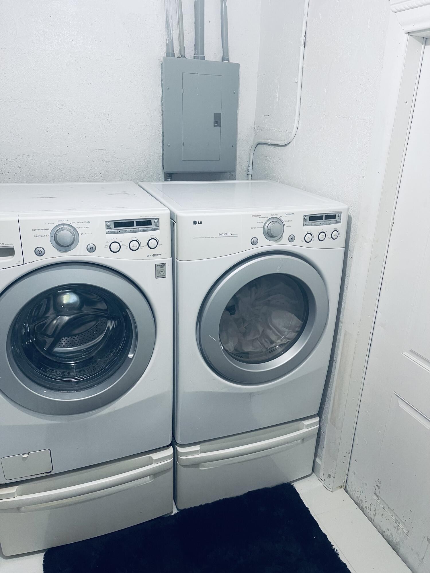 5537 Southwest 6th Street Margate, FL 33068 - Photo 40 of 40 a utility room with dryer and washer