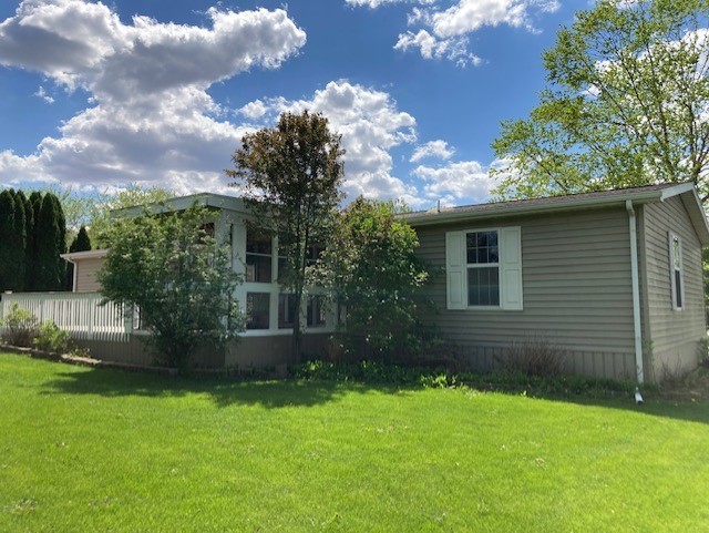 895 Cayuga Trail Marengo, IL 60152 - Photo 33 of 39 a front view of a house with garden