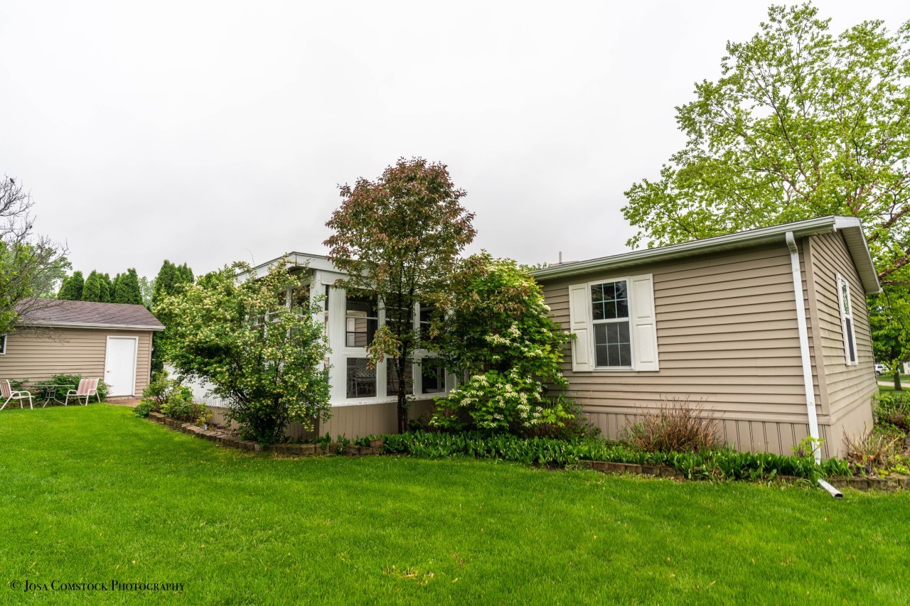 895 Cayuga Trail Marengo, IL 60152 - Photo 37 of 39 a view of a house with a yard