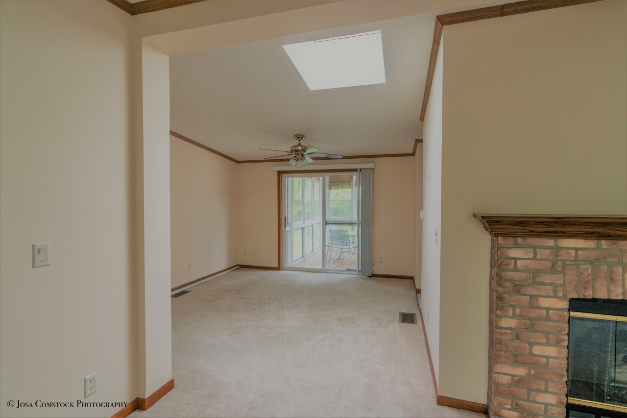 895 Cayuga Trail Marengo, IL 60152 - Photo 10 of 39 a view of an empty room with glass door