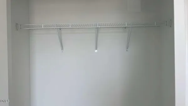 a view of empty room with windows