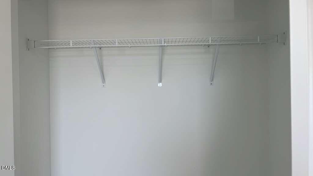 142 Blossom Fld Way Angier, NC 27501 - Photo 20 of 33 a view of a rack on the wall