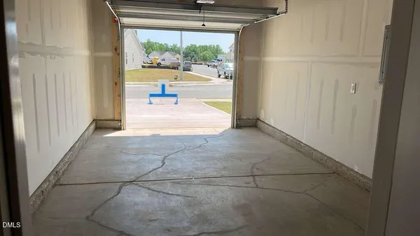 a front view of a house with a garage