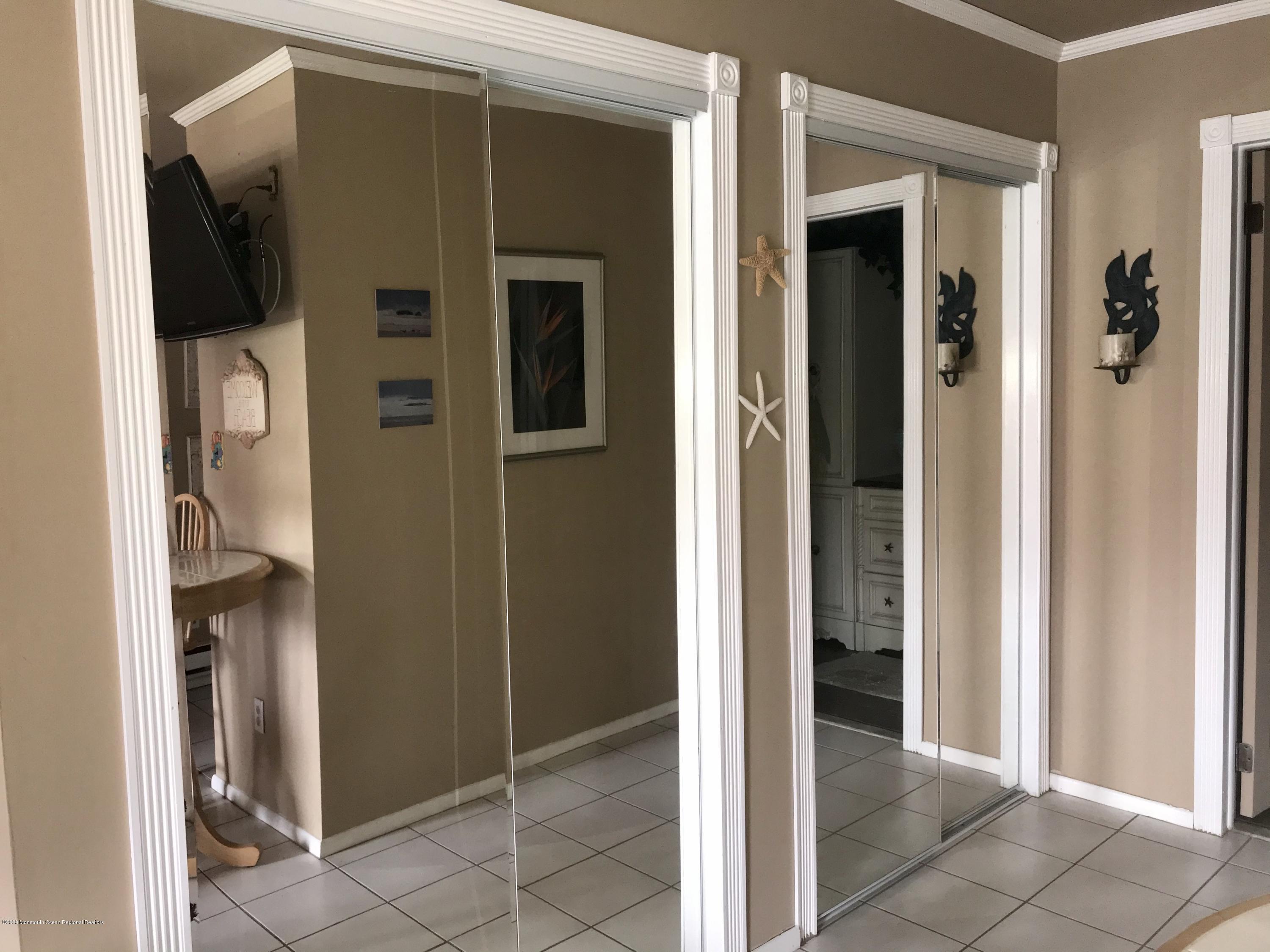 1501 Ocean Avenue, Unit B9 Belmar, NJ 07719 - Photo 8 of 26 Hall of mirrored closets