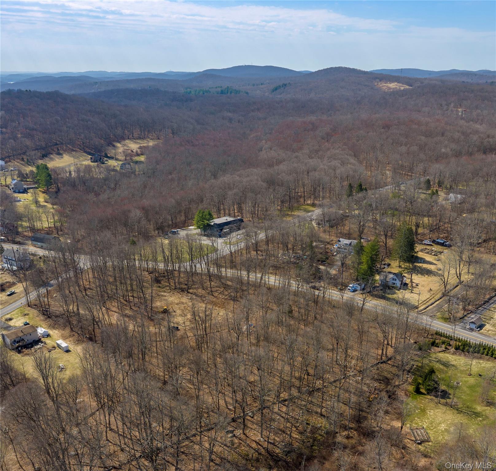 576 Holmes Road Holmes, NY 12531 - Photo 4 of 12 The larger 3.19-acre parcel boasts 567 feet of frontage on Route 52 and 204 feet on Holmes Road. The second parcel offers 155 feet of frontage on Route 52 with a depth of 382 feet.