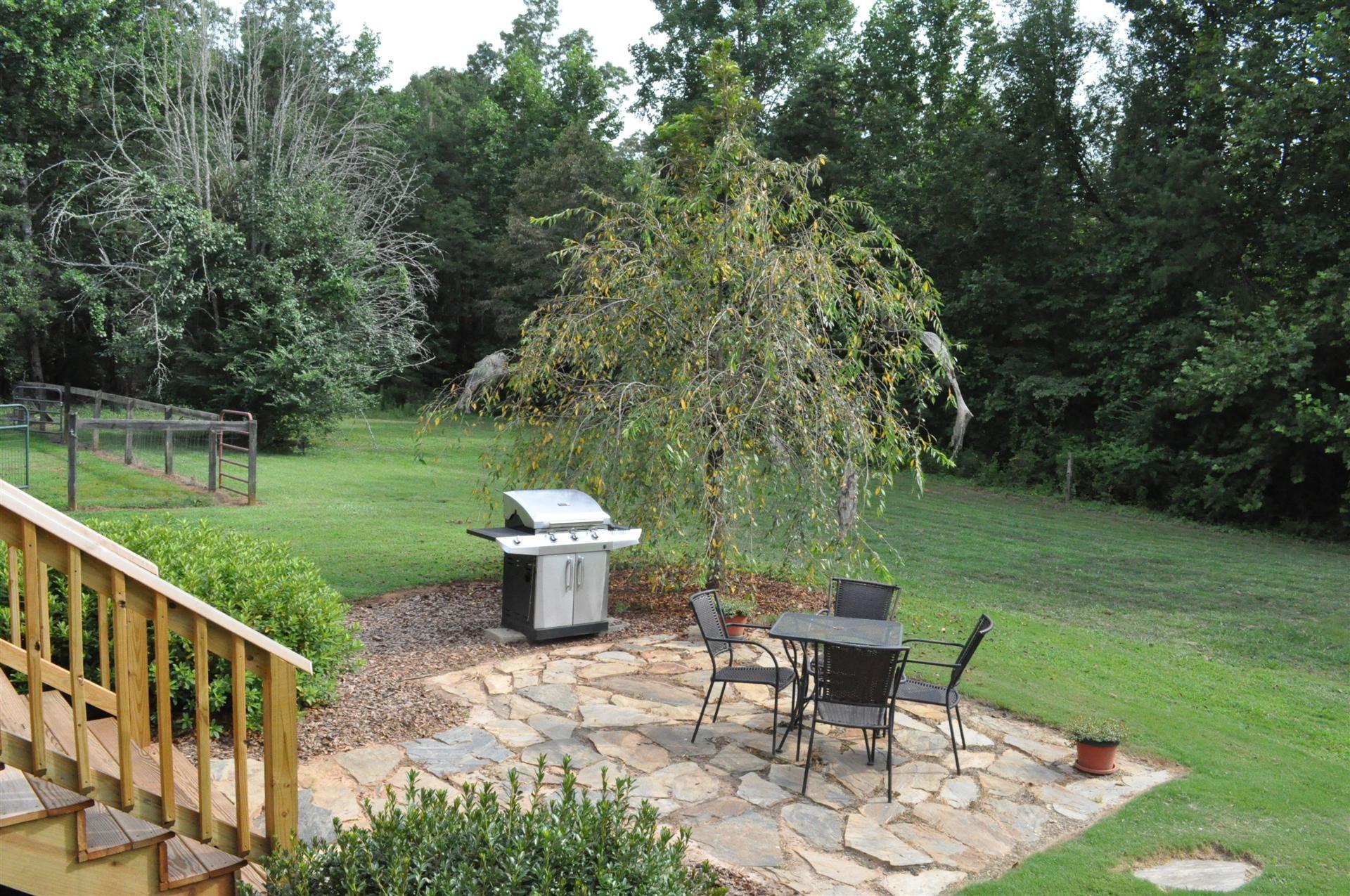 505 White Oak Lane Tryon, NC 28782 - Photo 15 of 43 a view of a garden with furniture