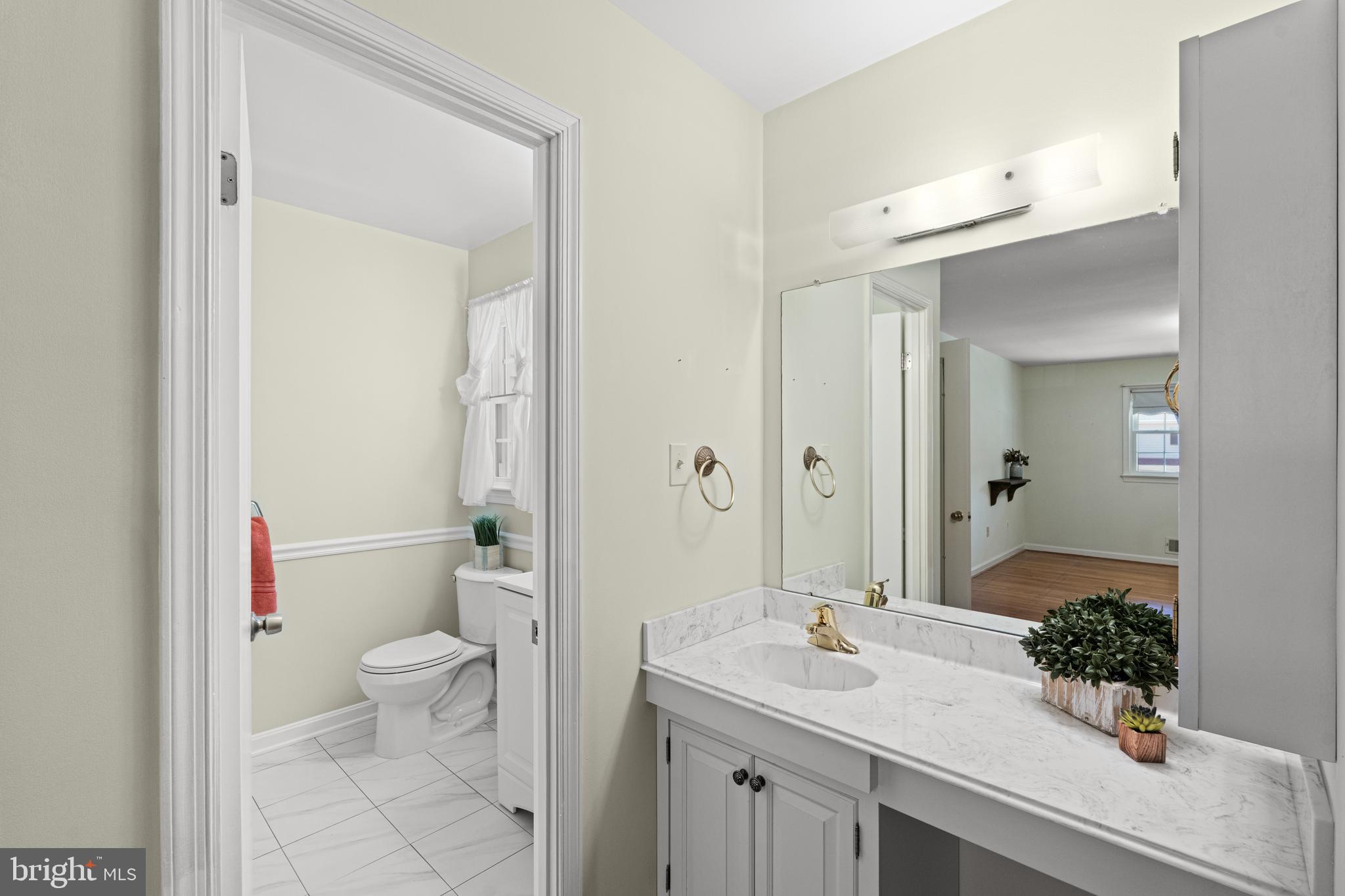 6703 Red Jacket Road Springfield, VA 22152 - Photo 18 of 31 Newer Vanity top and faucet