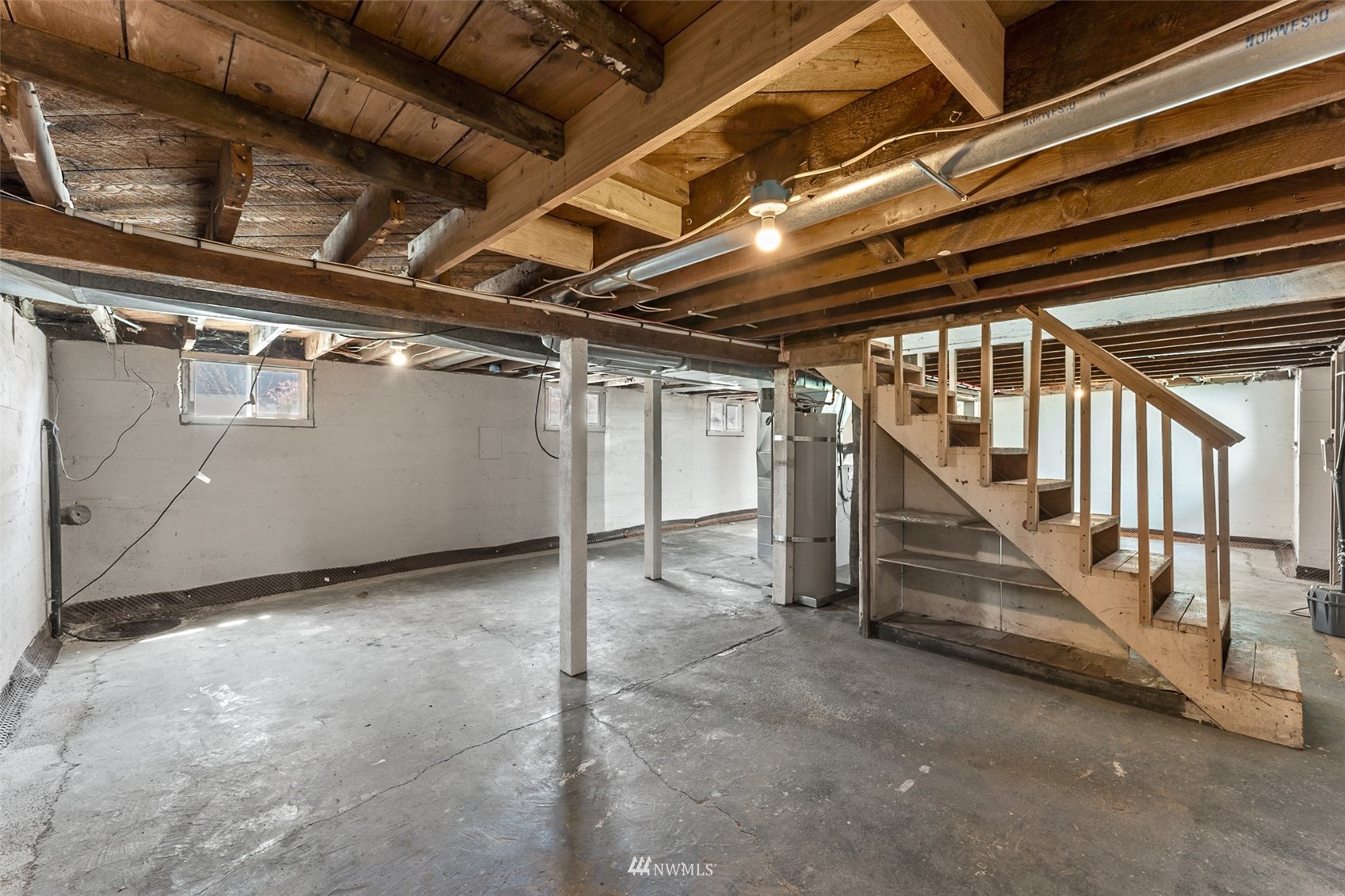 1234 South State Street Tacoma, WA 98405 - Photo 22 of 26 a view of an empty room with stairs