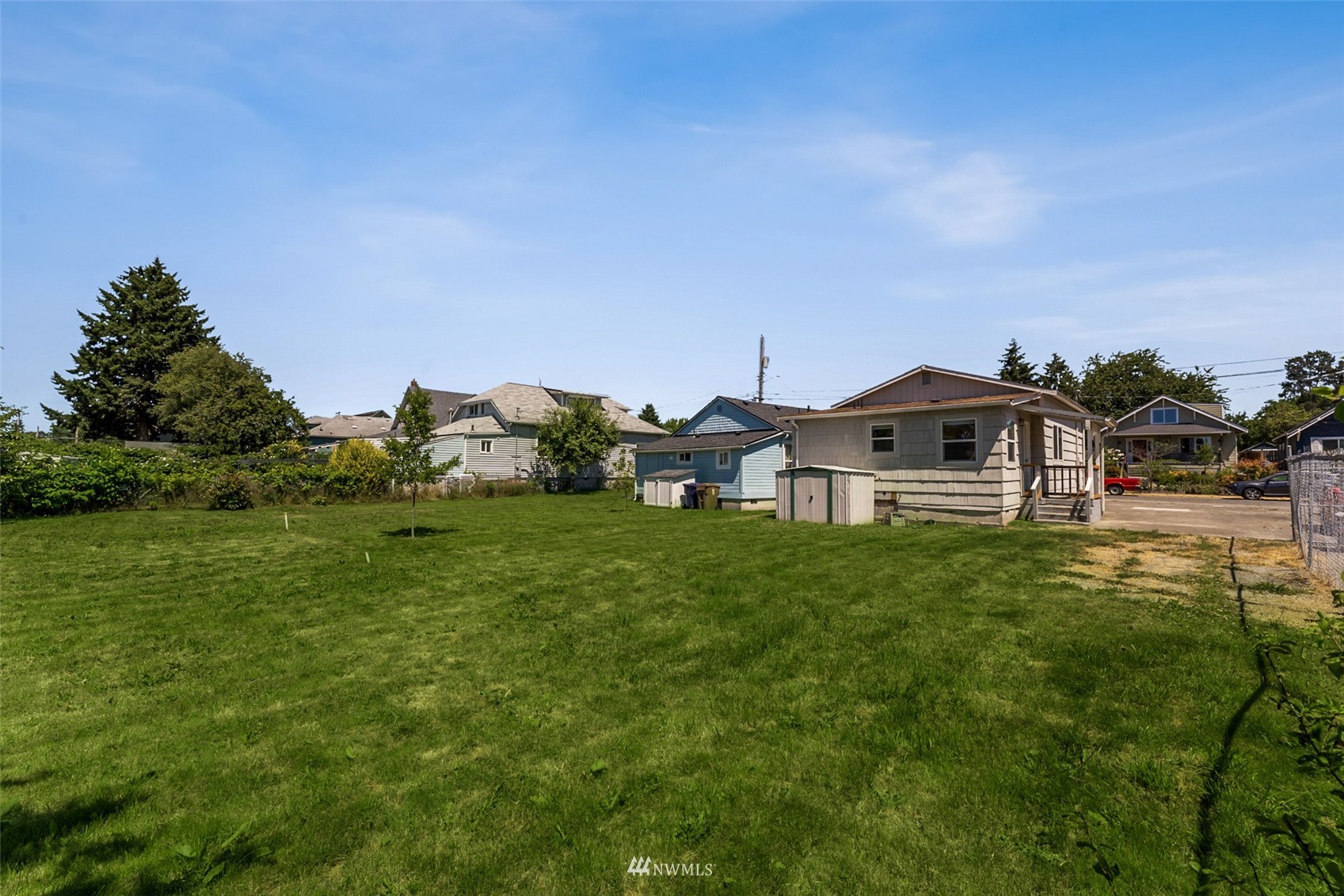 1234 South State Street Tacoma, WA 98405 - Photo 24 of 26 a front view of a house with garden