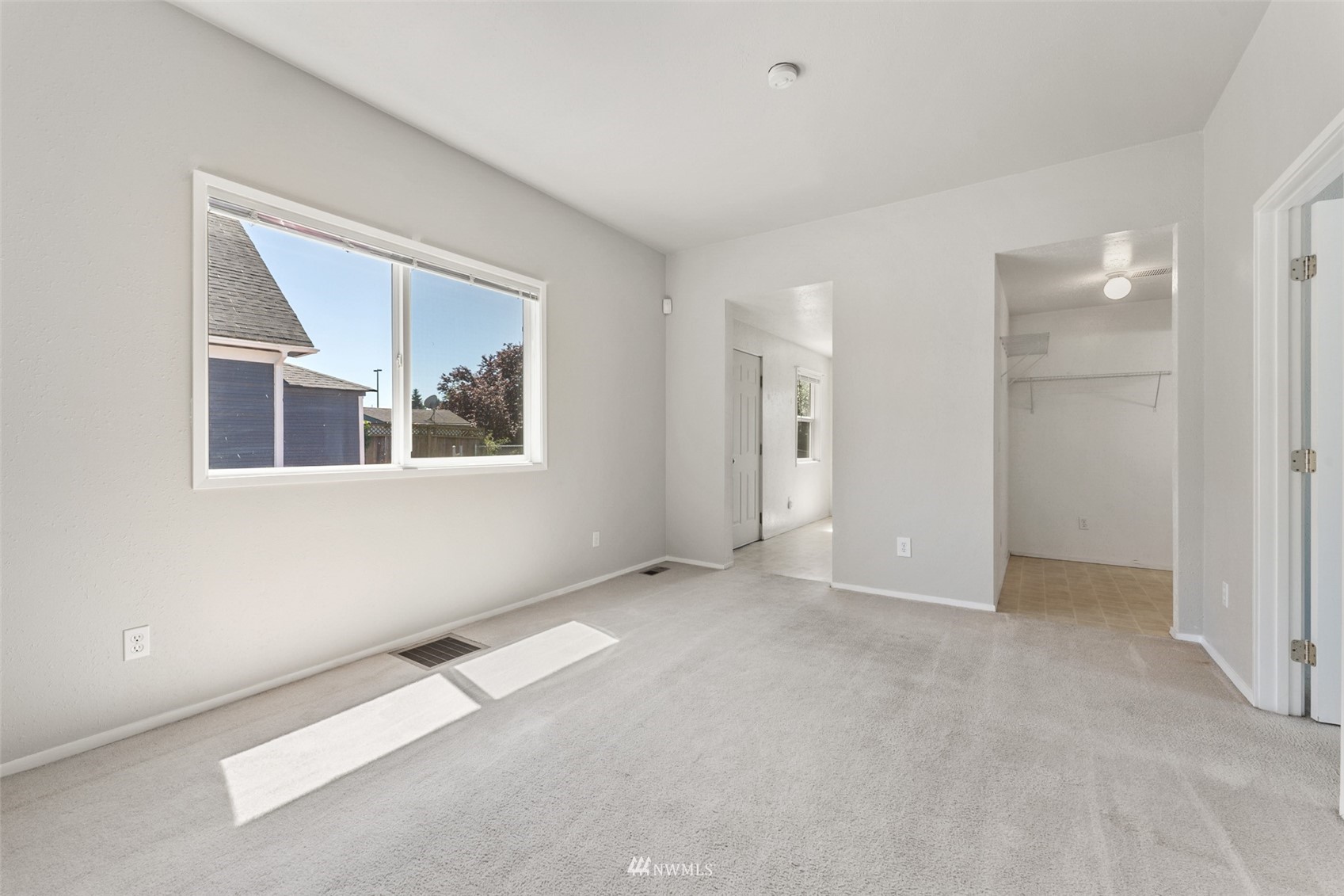 1234 South State Street Tacoma, WA 98405 - Photo 10 of 26 a view of an empty room with a window