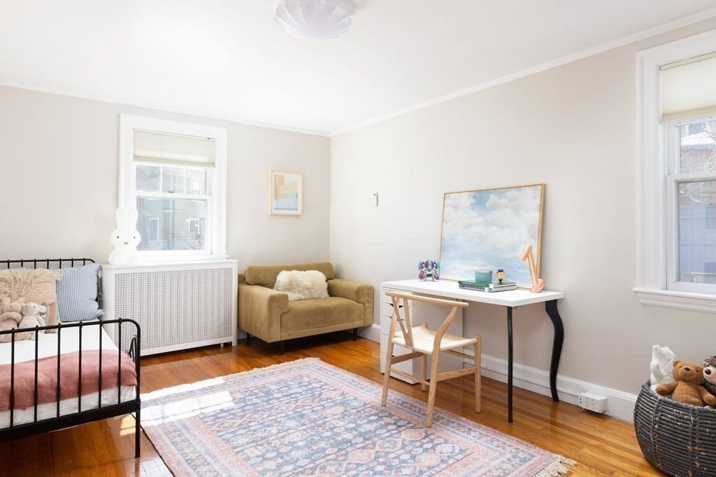 24 Jordan Road Brookline, MA 02446 - Photo 13 of 27 a living room with furniture and wooden floor