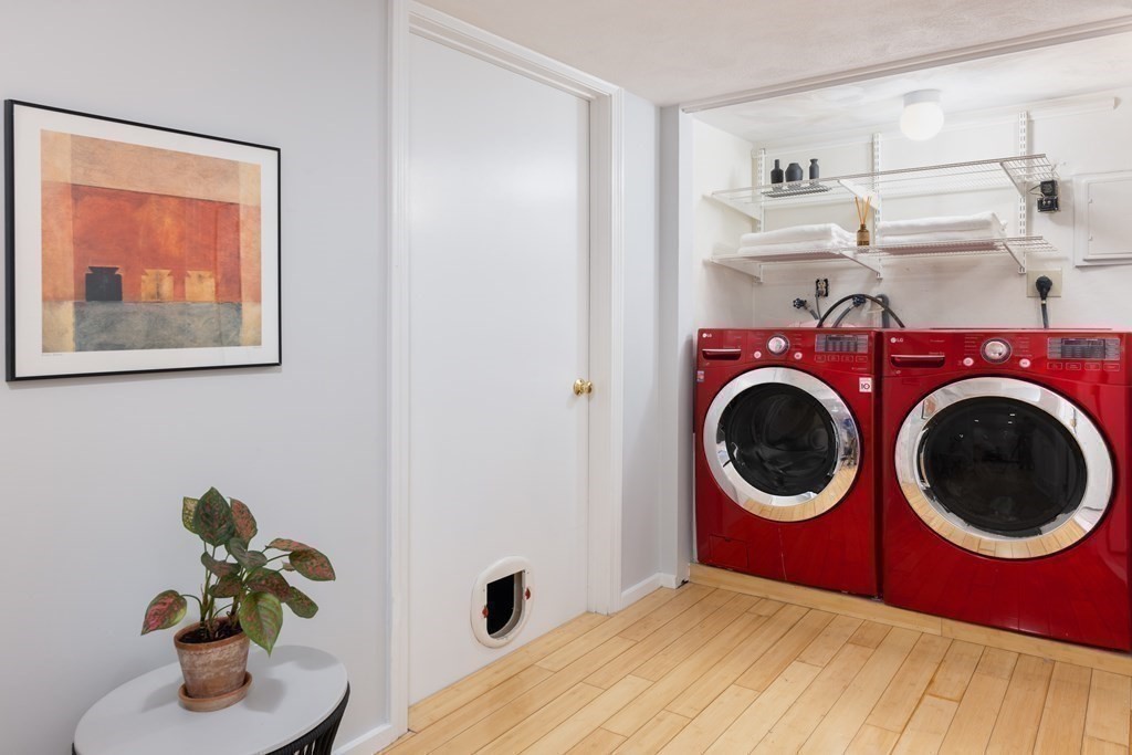 24 Jordan Road Brookline, MA 02446 - Photo 19 of 27 a bedroom with a bed and utility room