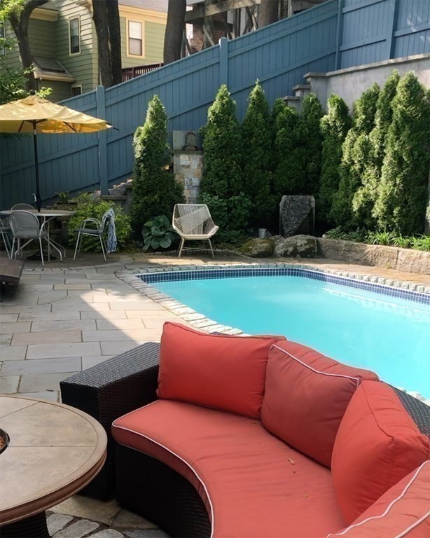 24 Jordan Road Brookline, MA 02446 - Photo 25 of 27 a outdoor sitting area with furniture and garden