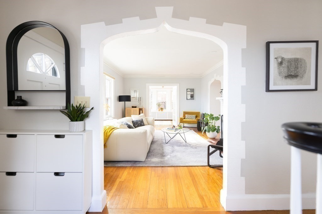24 Jordan Road Brookline, MA 02446 - Photo 6 of 27 a living room with furniture and a large window