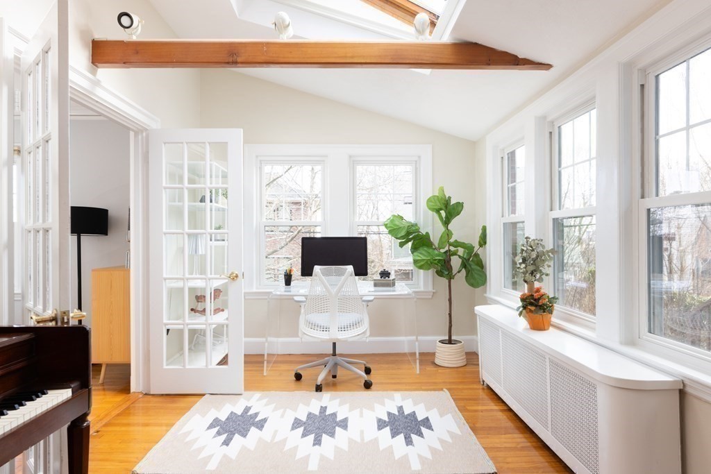 24 Jordan Road Brookline, MA 02446 - Photo 8 of 27 a living room with furniture and a potted plant