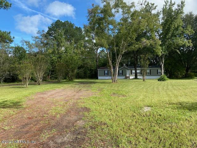 54311 Heron Road Callahan, FL 32011 - Photo 1 of 36 a house view with a outdoor space