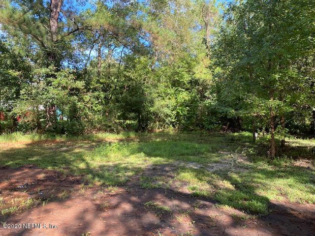 54311 Heron Road Callahan, FL 32011 - Photo 11 of 36 a view of a yard with a tree