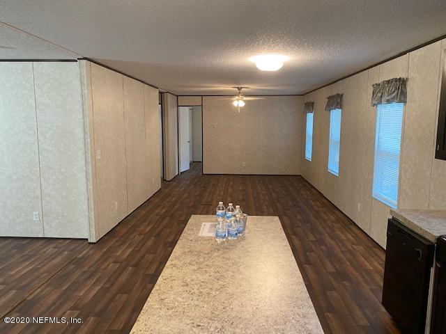 54311 Heron Road Callahan, FL 32011 - Photo 21 of 36 a view of gallery with wooden floor