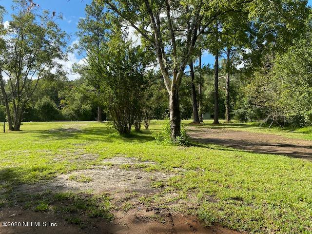 54311 Heron Road Callahan, FL 32011 - Photo 6 of 36 a view of a yard with a tree