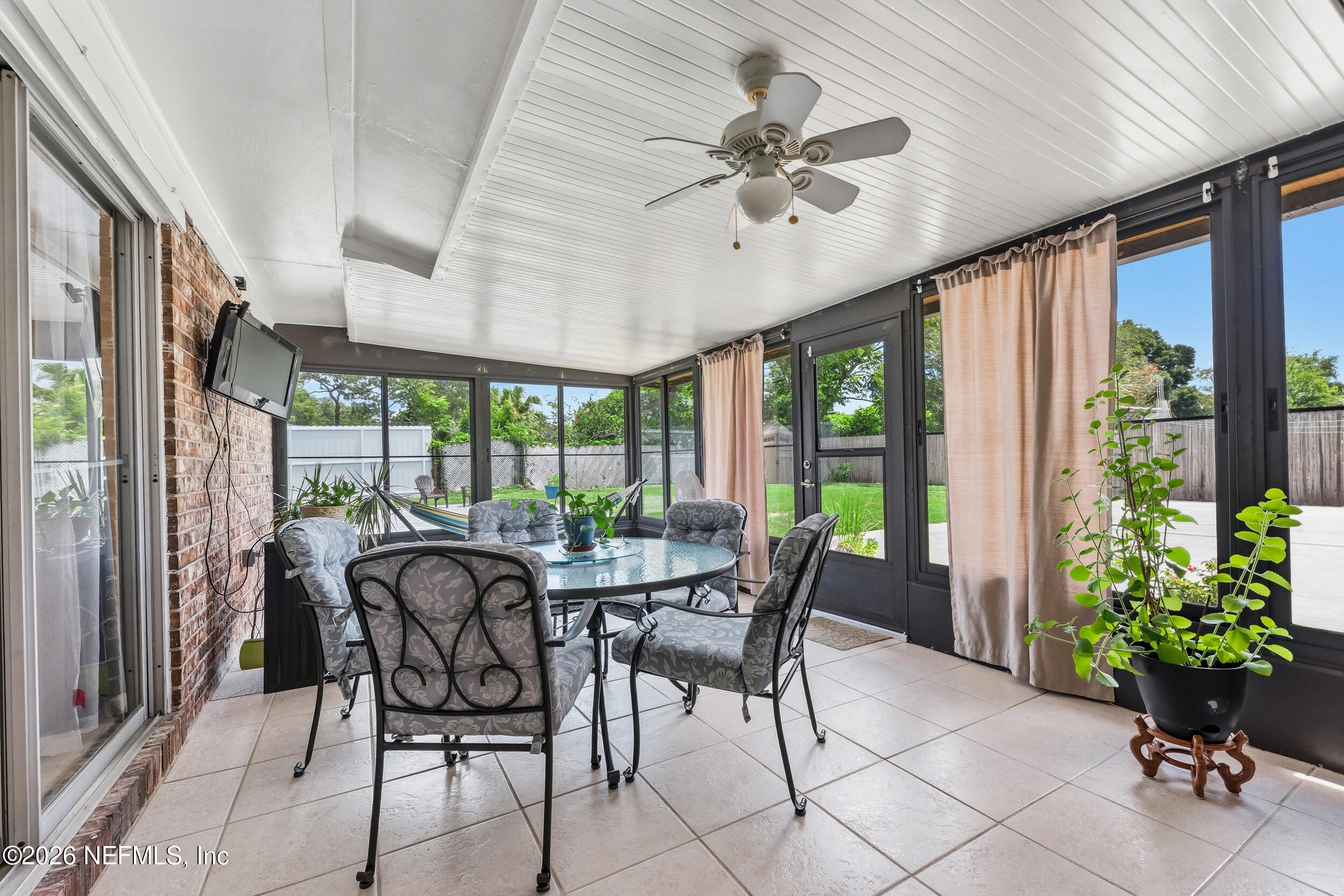 7255 Floral Ridge Drive Jacksonville, FL 32277 - Photo 21 of 25 Enclosed Sunroom with Split AC
