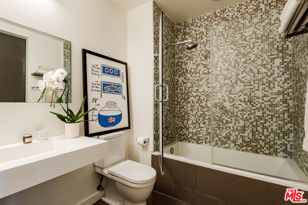 1912 Broadway, Unit 205 Santa Monica, CA 90404 - Photo 15 of 22 a bathroom with a toilet sink and shower