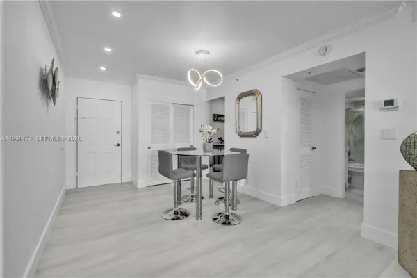 a view of a dining room with furniture