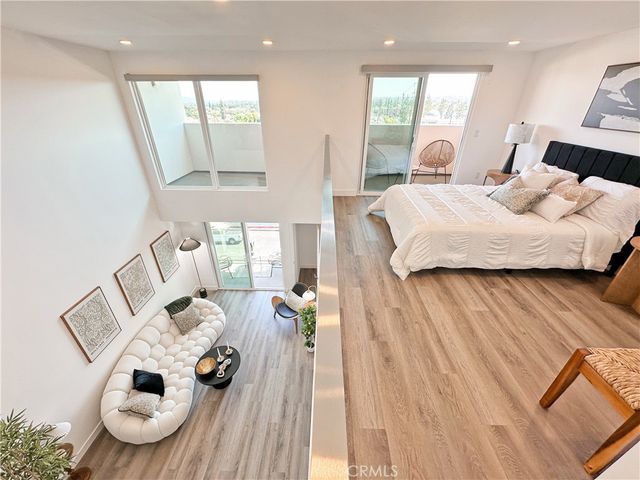 a bathroom with a double vanity sink mirror and toilet