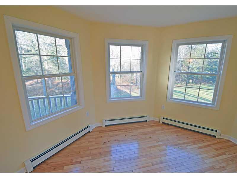 642 Oak Point Road Trenton, ME 04605 - Photo 21 of 35 Triple bay window in living room. ...