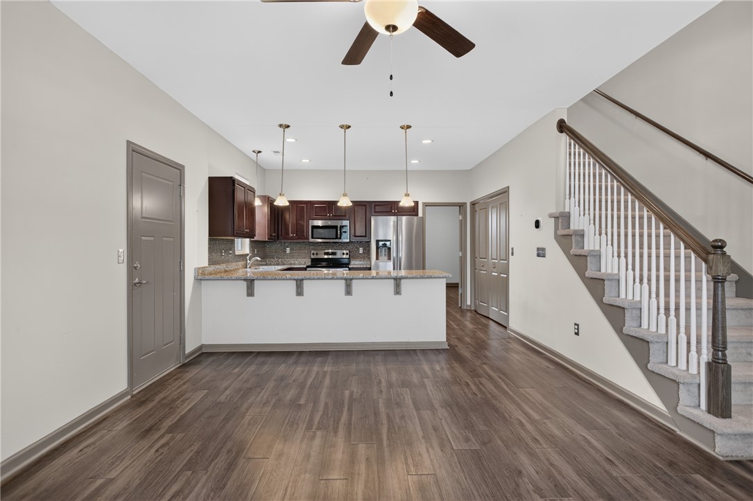 235 Pendleton Road, Unit K1 Clemson, SC 29631 - Photo 13 of 49 An inviting open-concept layout seamlessly connects the well-appointed kitchen to a comfortable living area, ideal for relaxed entertaining.