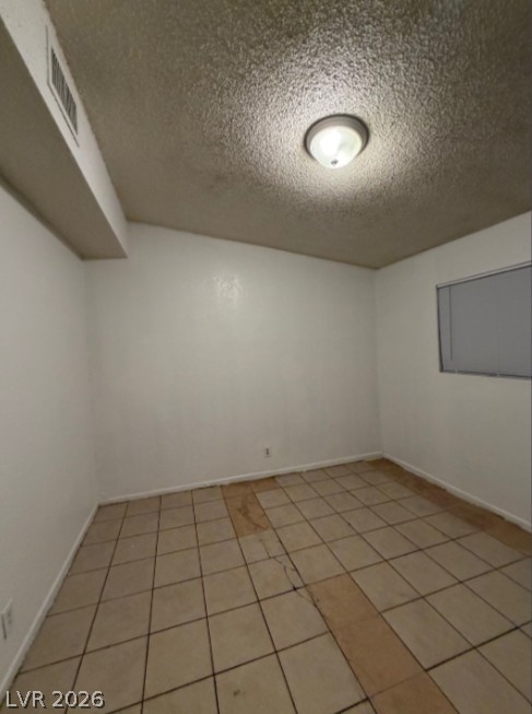 521 North Decatur Boulevard, Unit B Las Vegas, NV 89107 - Photo 14 of 17 A well-proportioned room with a window, ready for your personalized touch.