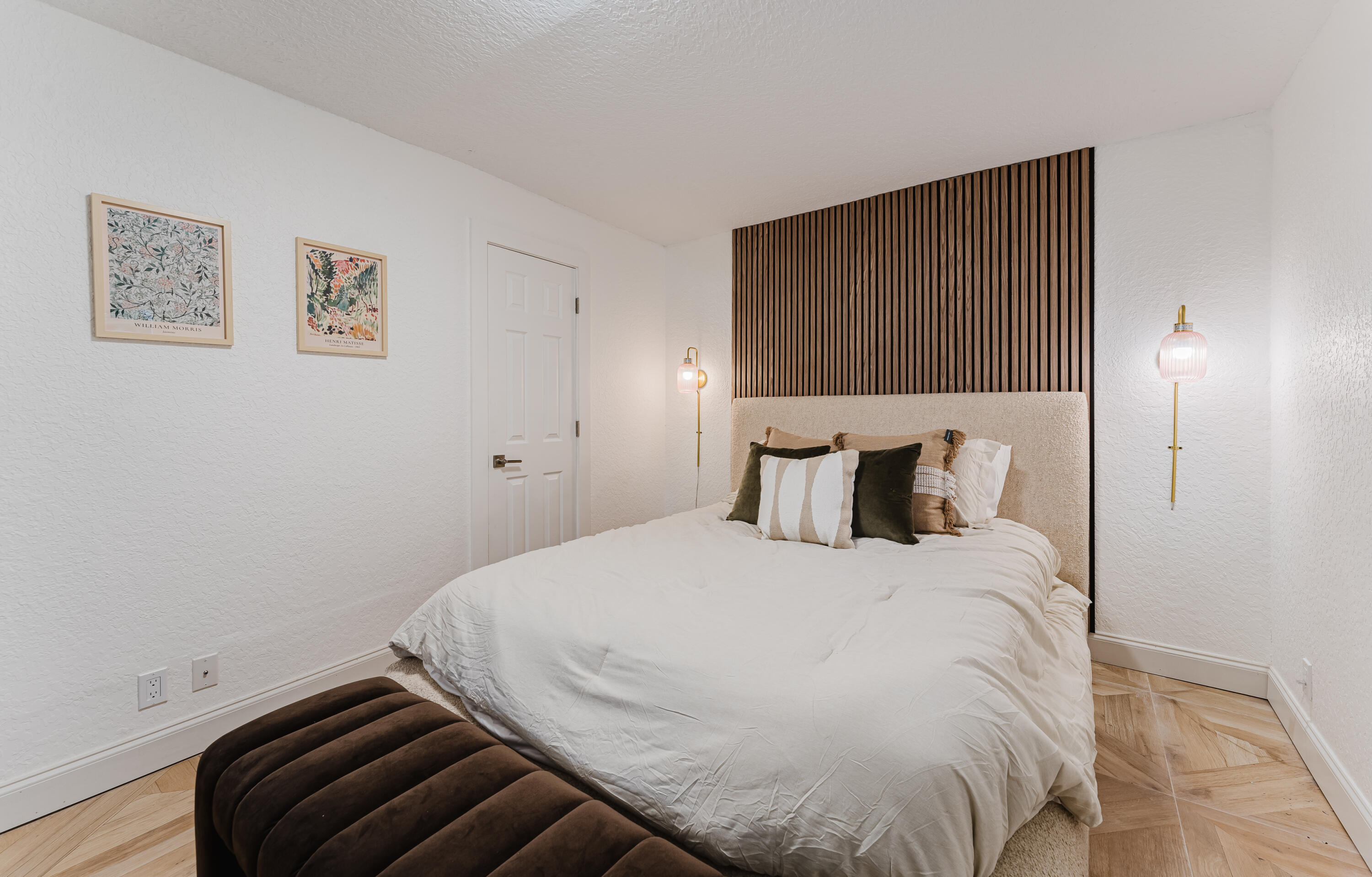 921 Ortega Road West Palm Beach, FL 33405 - Photo 39 of 60 a bedroom with a bed and wooden floor
