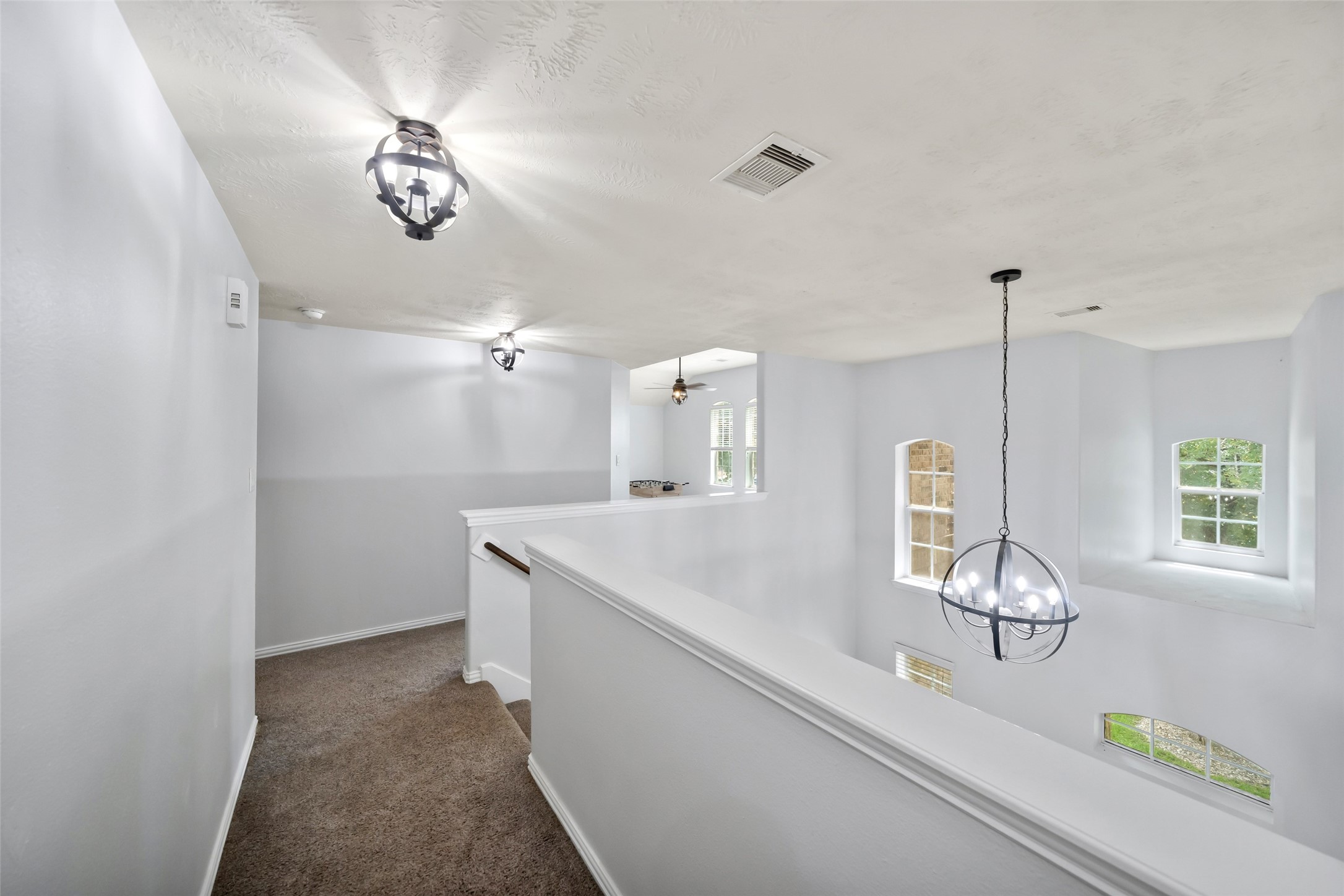 81 Palos Verde Conroe, TX 77304 - Photo 29 of 36 View from bedrooms 3,4 & 5 Large linen closet in hallway