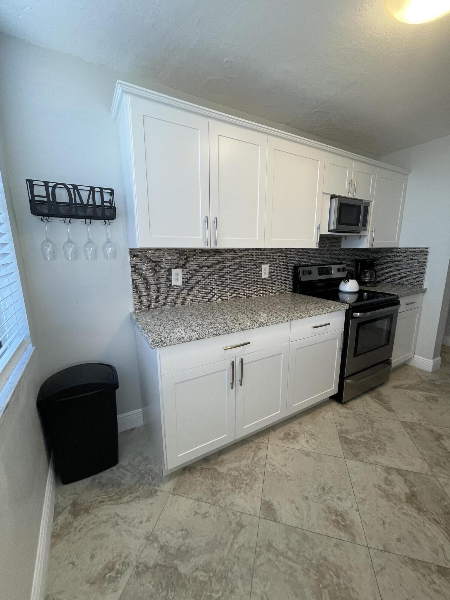 955 Dotterel Road, Unit 2511 Delray Beach, FL 33444 - Photo 3 of 18 955 Dotterel - Kitchen