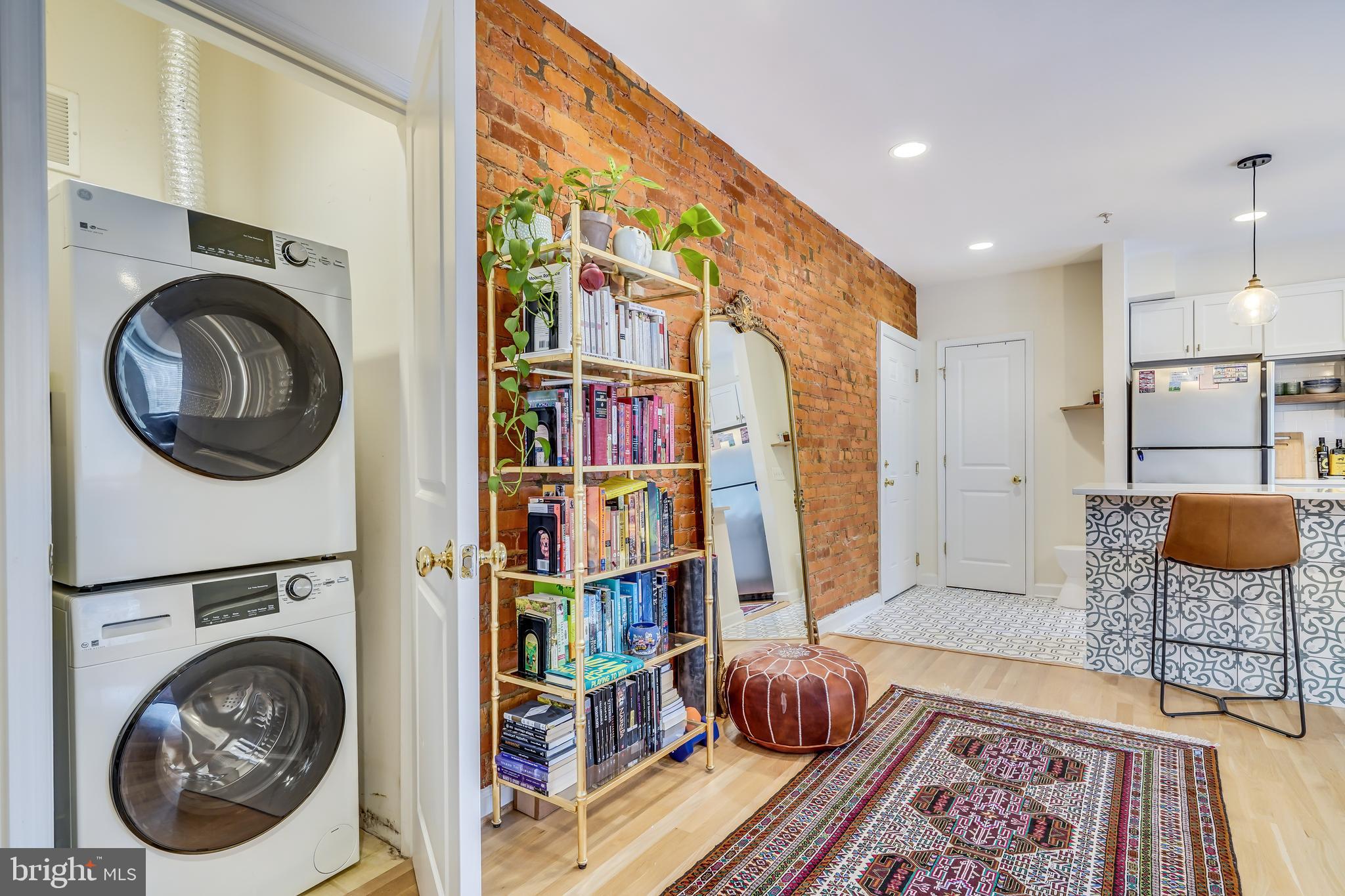 5405 9th Street Northwest, Unit 106 Washington, DC 20011 - Photo 14 of 21 a living room with furniture and a rug