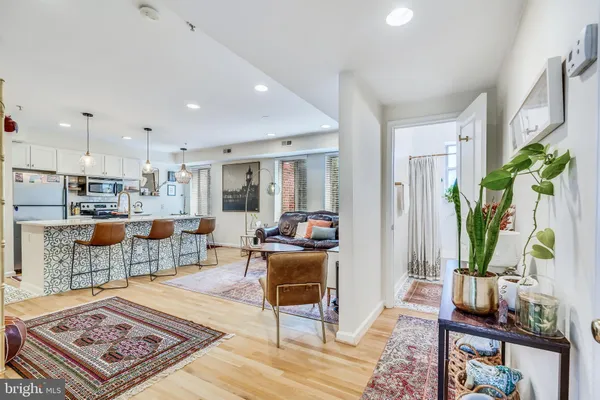 a living room with furniture and a table