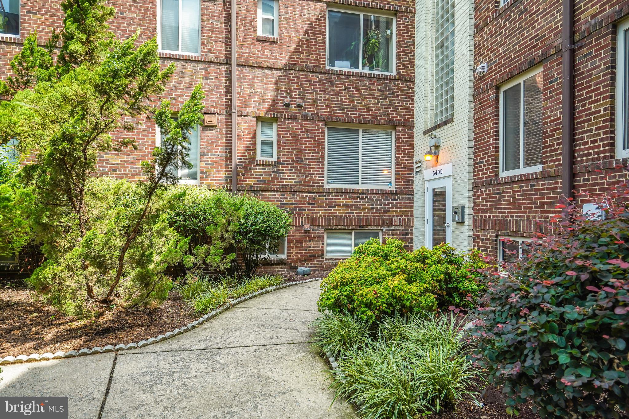 5405 9th Street Northwest, Unit 106 Washington, DC 20011 - Photo 21 of 21 a front view of a house with garden