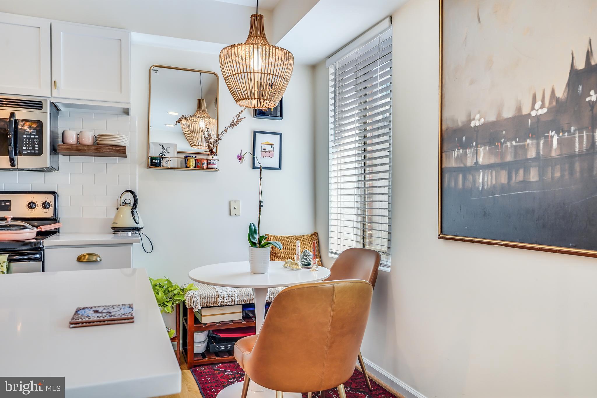 5405 9th Street Northwest, Unit 106 Washington, DC 20011 - Photo 10 of 21 a dining room with furniture and window